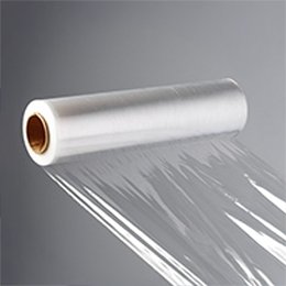 A roll of clear protective film, partly unrolled.