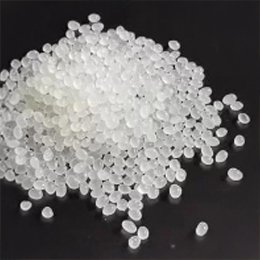 A pile of translucent polyethylene resin pellets.